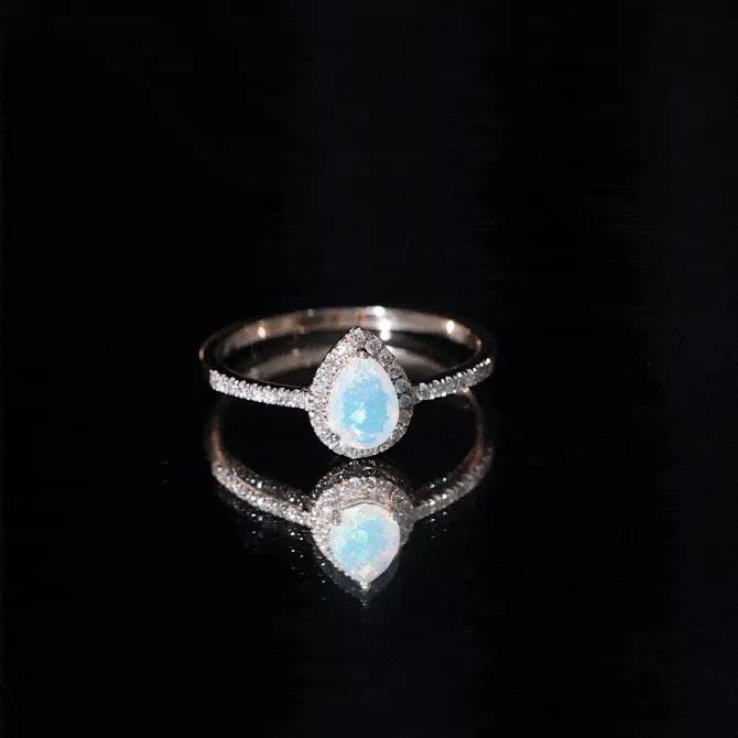 1 CT Pear Cut Ethiopian Opal Ring with Diamond Halo