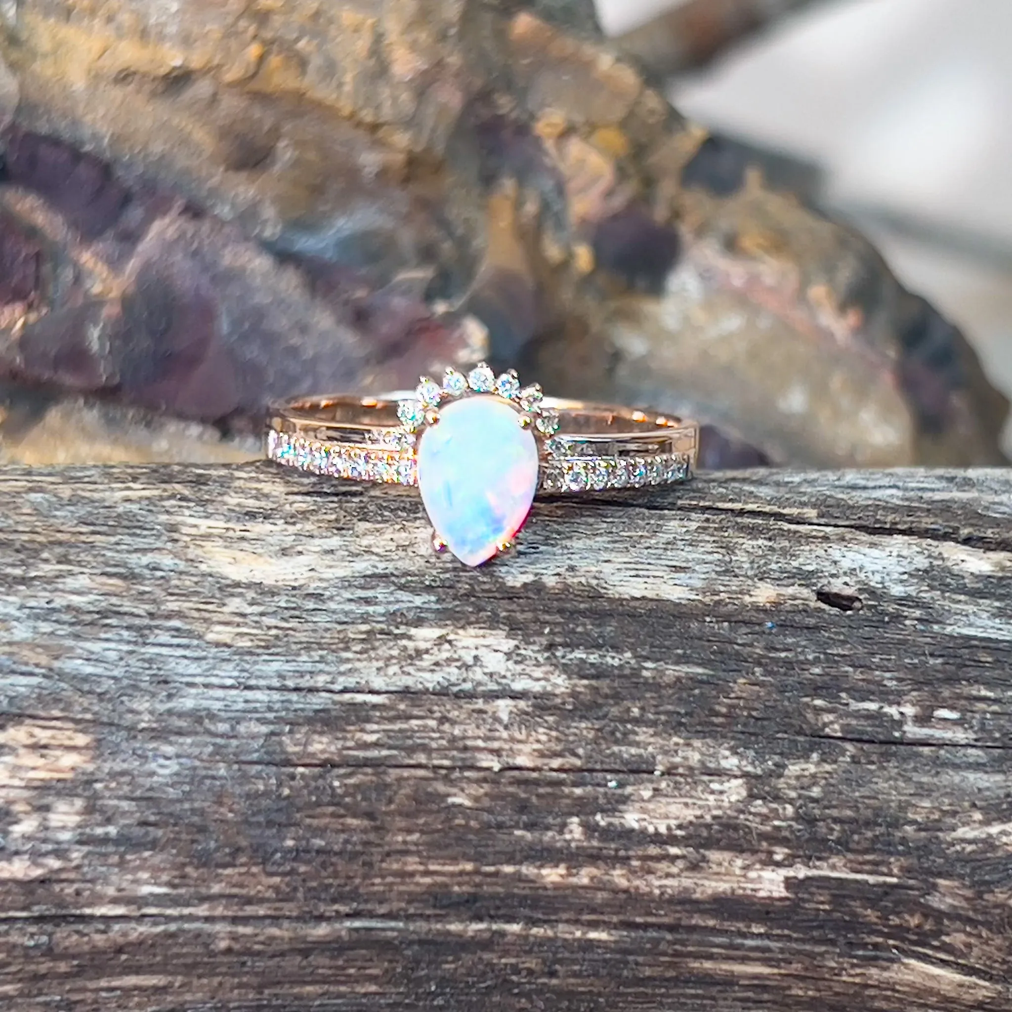 14kt Rose Gold pear shape Opal and diamond ring