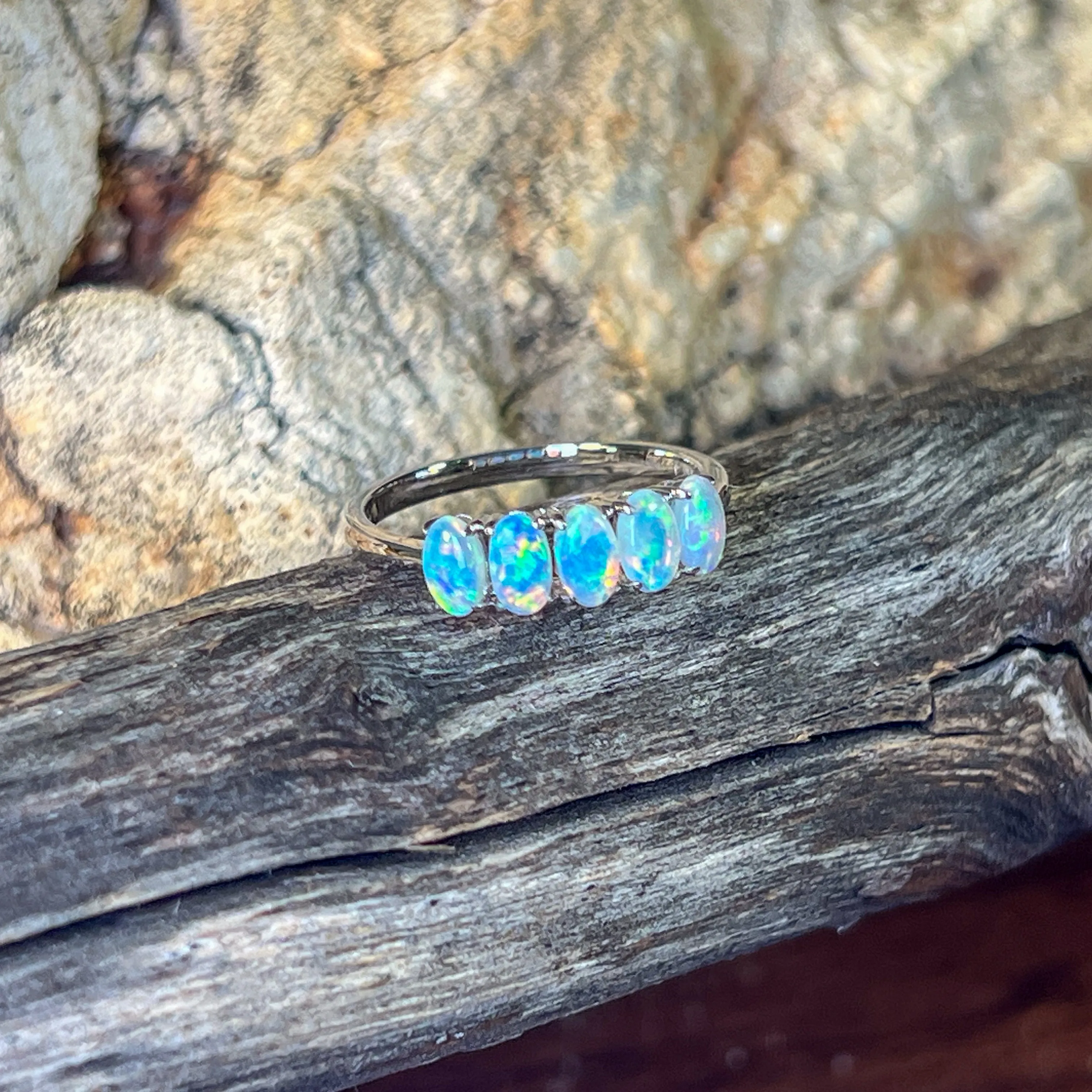 14kt White Gold Crystal Opal 0.76ct half eternity band