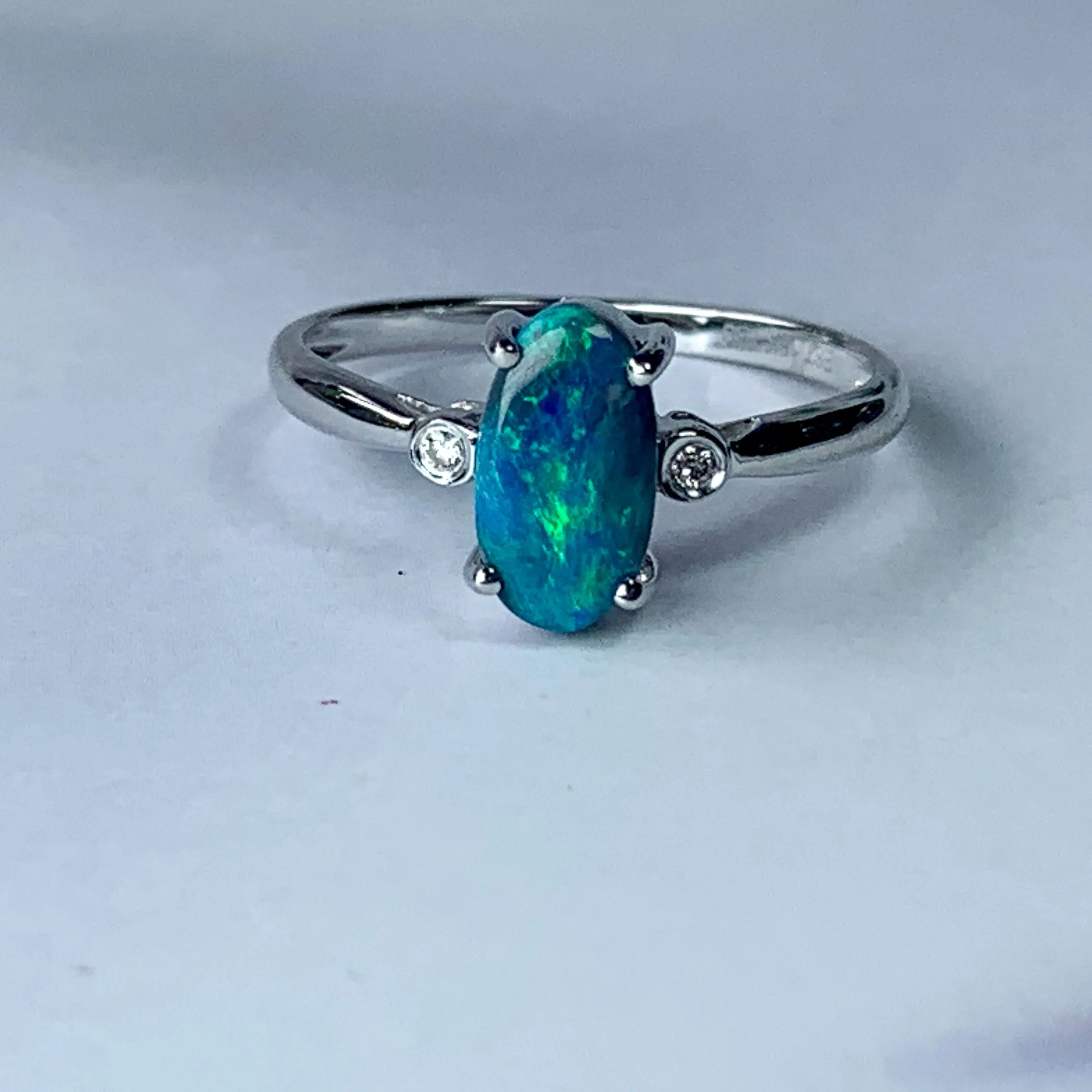 18kt White Gold Black Opal 0.83ct and Diamond ring