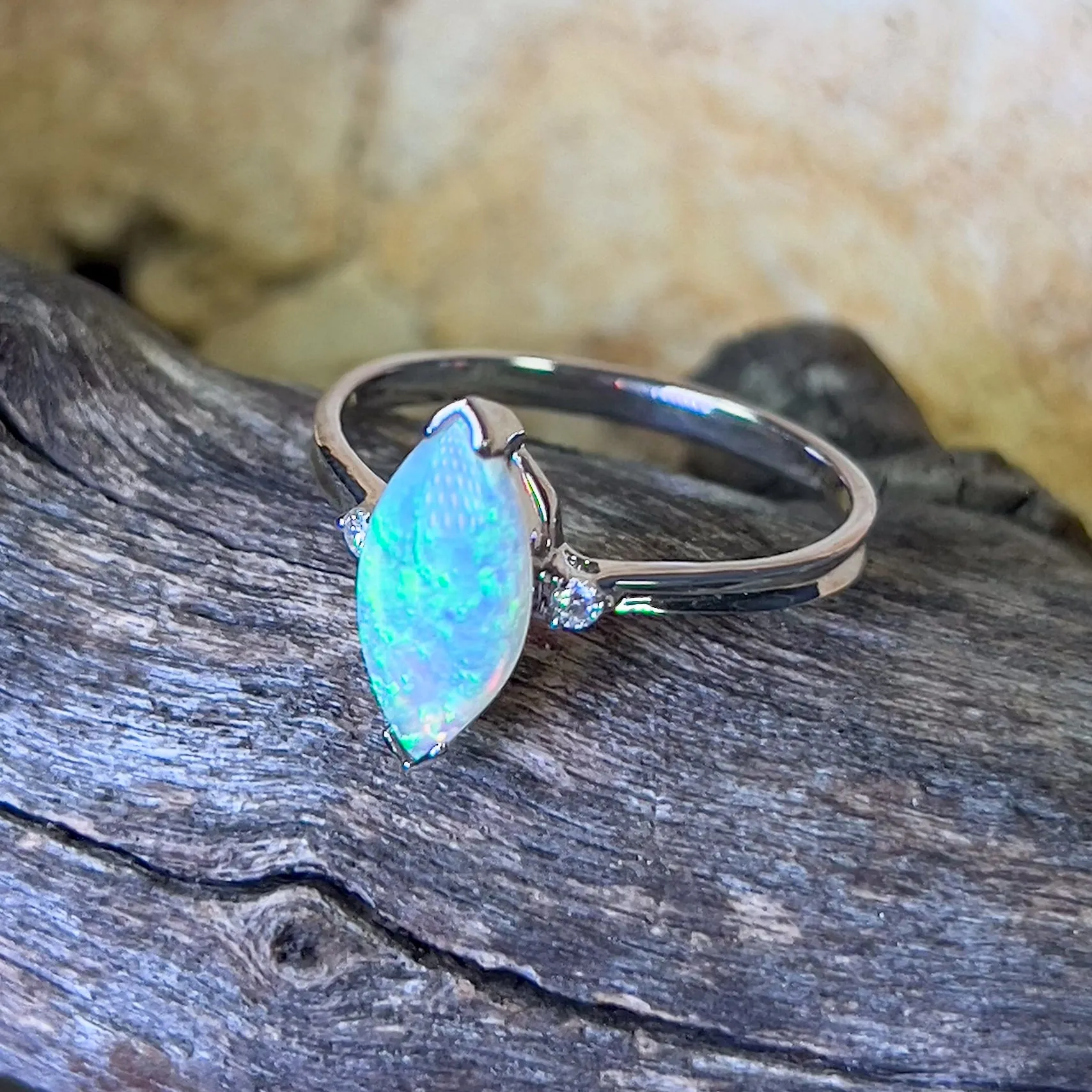 18kt White Gold Marquise Crystal Opal and diamond ring