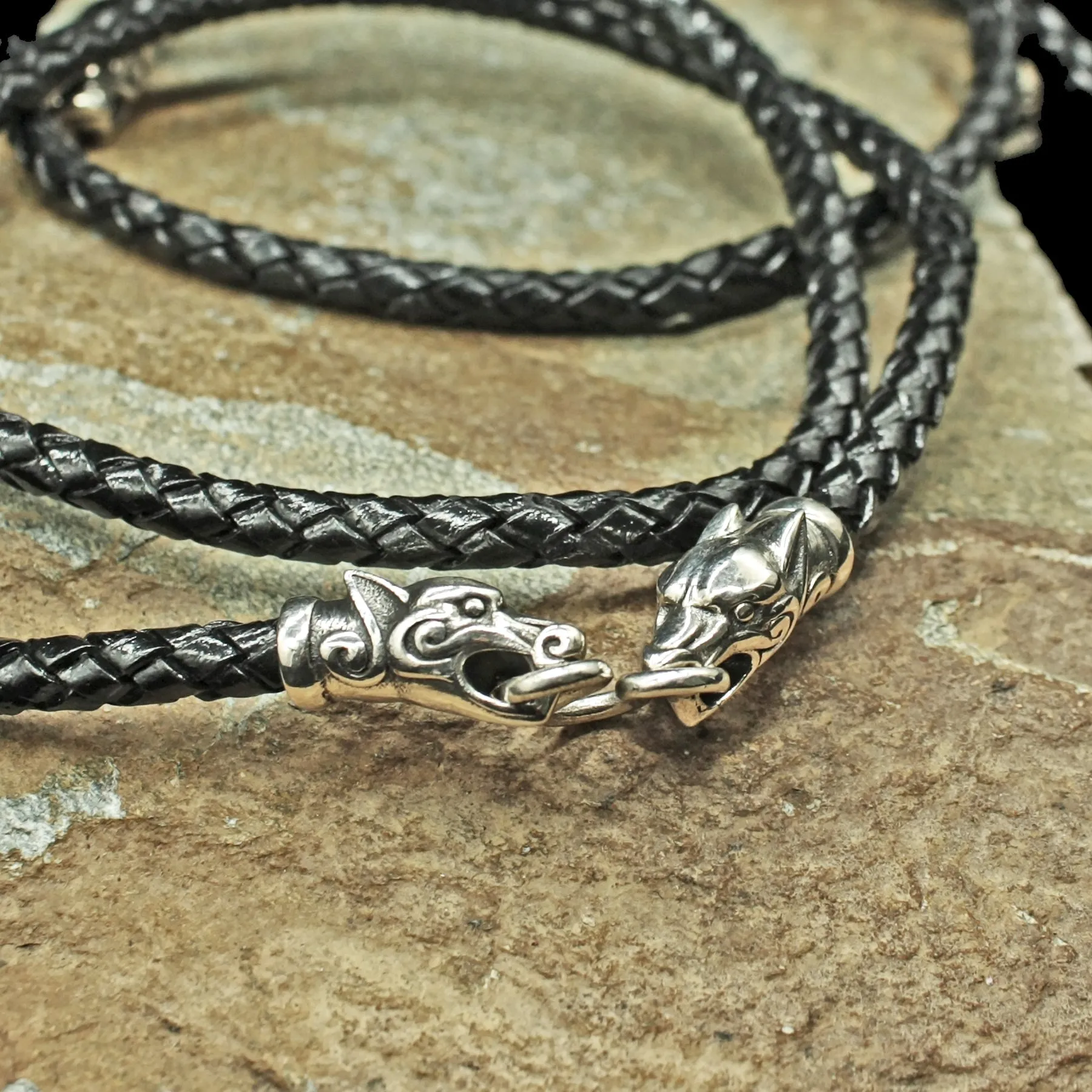 Braided Leather Necklace with Silver Ferocious Wolf Heads