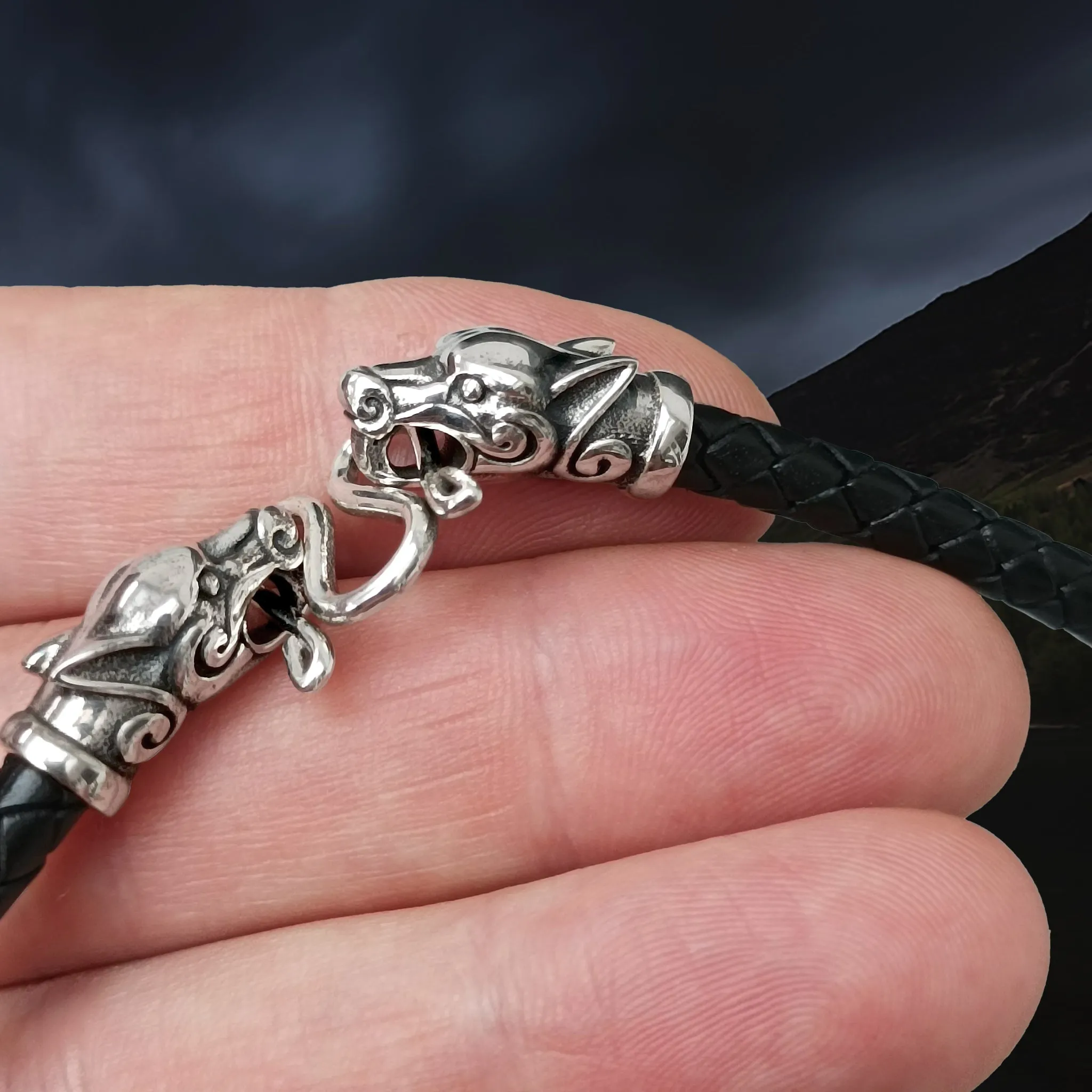 Braided Leather Necklace with Silver Ferocious Wolf Heads