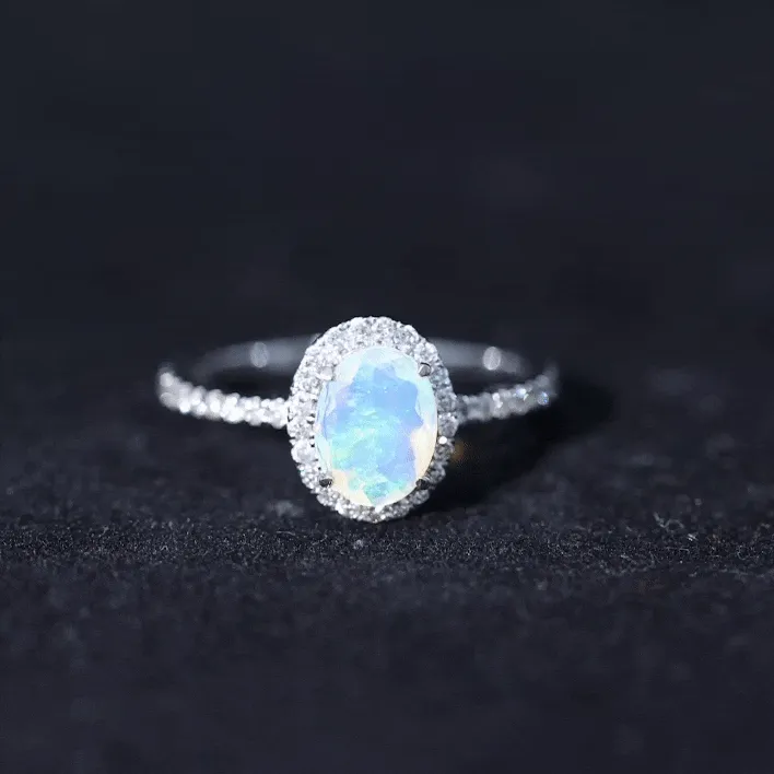 Oval Shape Ethiopian Opal and Diamond Halo Engagement Ring