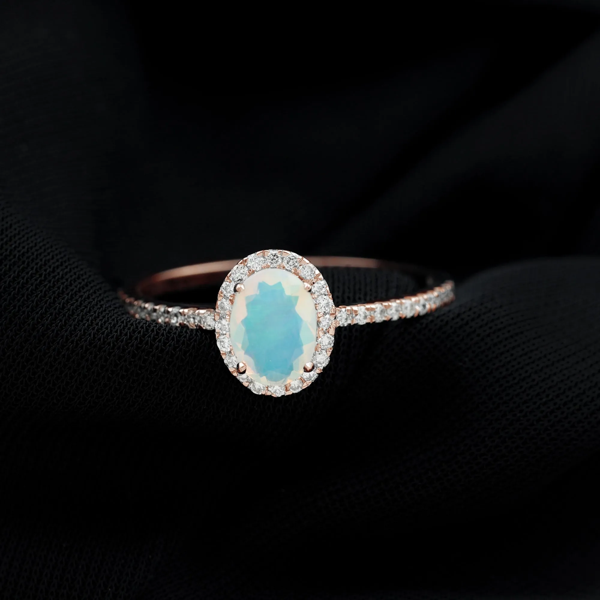 Oval Shape Ethiopian Opal and Diamond Halo Engagement Ring