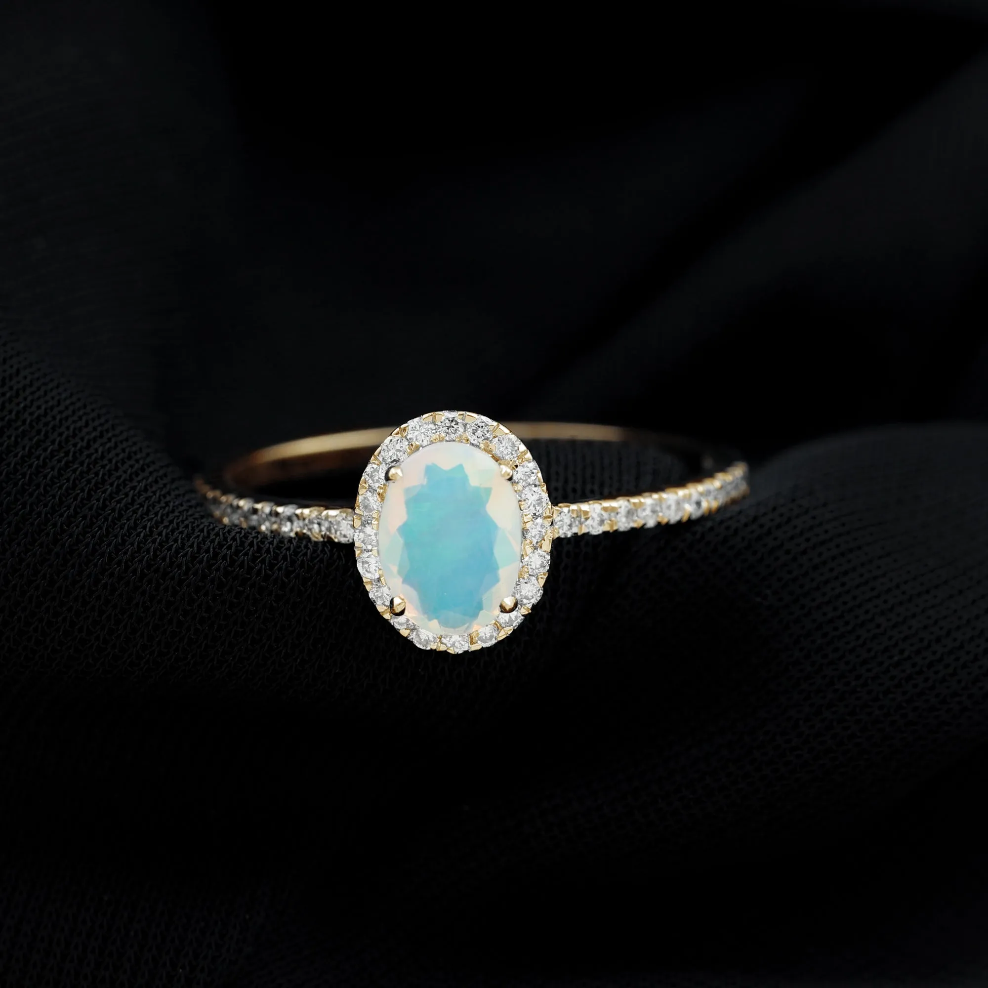 Oval Shape Ethiopian Opal and Diamond Halo Engagement Ring